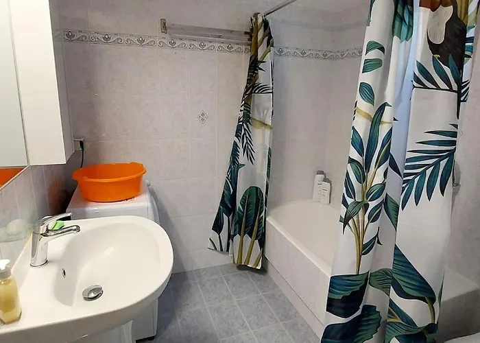 Апартаменты Serenity By The Sunset *